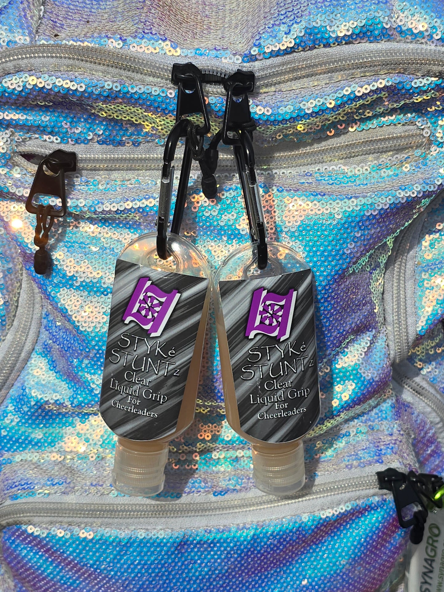 STYKe STUNTz 50mL Stealth/Clear Liquid Grip with carabiner.